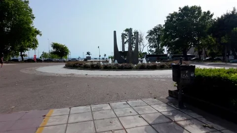 Walking Towards the YMCA Park Fountain in Thessaloniki, Greece