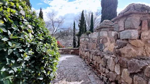 Historic City Walls Walk near San Martín Park, Sunny Toledo Historic City Walls Walk near San Martín Park, Sunny Toledo