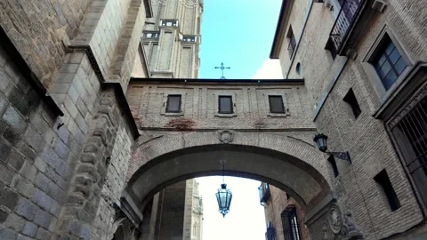 Passing Under the Historic Arch of C/ Arco de Palacio in Toledo Old Town Passing Under the Historic Arch of C/ Arco de Palacio in Toledo Old Town