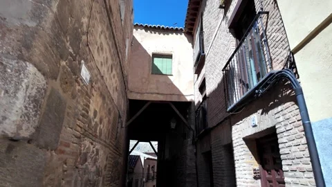 Walking Under the Historic Cobertizo del Pozo Amargo, Toledo Old Town Walking Under the Historic Cobertizo del Pozo Amargo, Toledo Old Town