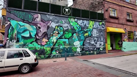 Bright Street Art Mural of Cartoon Characters in La Candelaria, Bogota