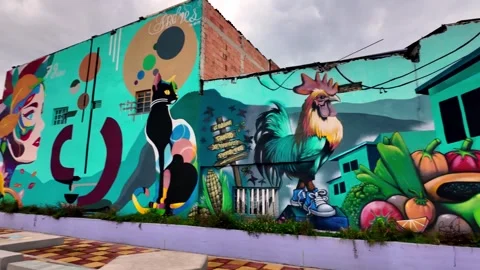 Panning Across Huge Colorful Street Art Mural on Building, Ciudad Bolivar