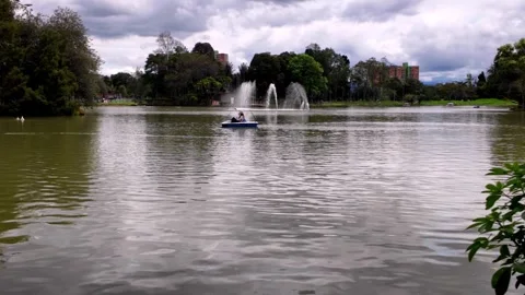 Tranquil Boat on Lake in Parque de los Novios, Bogota Urban Oasis