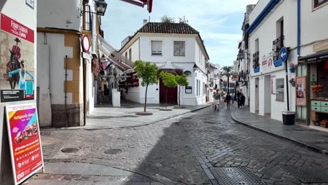 Walking POV along Calle Cardenal Gonzalez near Mezquita, Córdoba Walking POV along Calle Cardenal Gonzalez near Mezquita, Córdoba