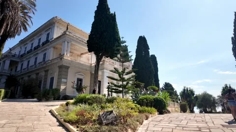 Walking Up To The Neoclassical Achilleion Palace Mansion in Corfu, Greece Walking Up To The Neoclassical Achilleion Palace Mansion in Corfu, Greece