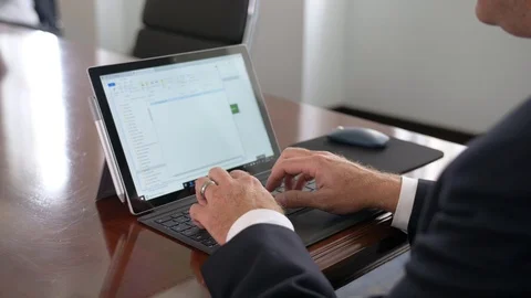 323. Business man typing on a computer in Conference room Stock-Footage 119732359