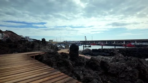 POV Walk on Wooden Boardwalk Over Volcanic Coastline in La Restinga, El Hierro