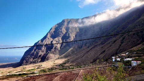Panoramic Pan Across El Golfo Valley Coastline Towards La Frontera Town
