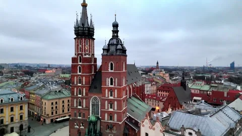 Aerial Rise Past St. Mary's Basilica Bugle Tower, Krakow Morning Sunrise Aerial Rise Past St. Mary's Basilica Bugle Tower, Krakow Morning Sunrise