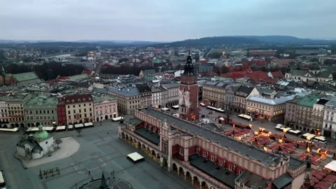 Aerial Flight Over Krakow Square Towards Sukiennice and Town Hall Tower Aerial Flight Over Krakow Square Towards Sukiennice and Town Hall Tower