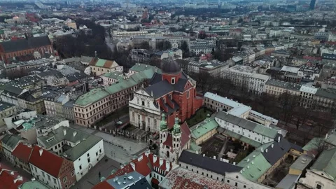 Drone Circles Historic Saints Peter and Paul Church in Winter Krakow, Poland. Drone Circles Historic Saints Peter and Paul Church in Winter Krakow, Poland.