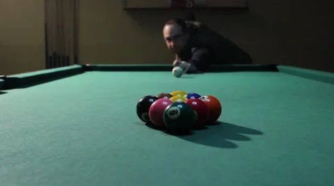 3/35 Man playing billiard. Player breaking balls on the pool table. 9-ball pool. Stock Footage 36431628