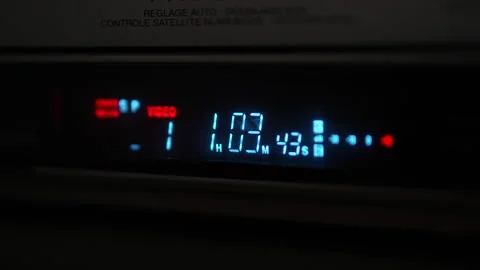3/4 closeup shot on fast rewind vcr display Stock Footage 335646646