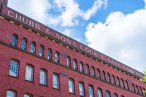3/4 view of an old lock manufacturing building by lock company, Chubb Stock Photos