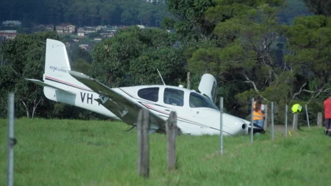 3/4/26: Investigators inspected light plane crash, camera zooms out Stock Footage 332052257