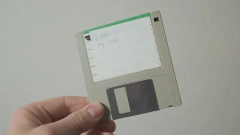 A 3.5" floppy disk held up. Stock Footage 101272331