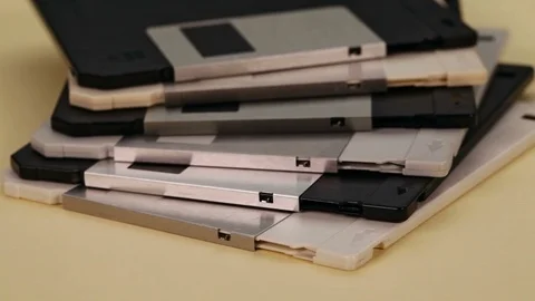 3.5 inch computer floppy disks in a stack Stock-Footage 90645322