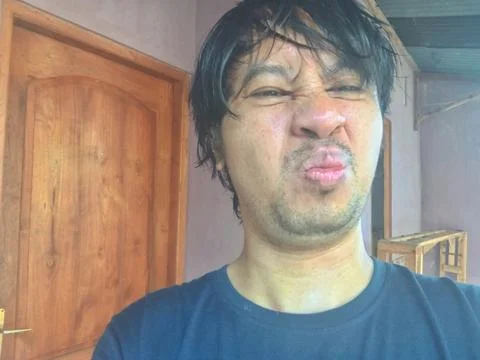 A 35-year-old man taking selfies using a variety of styles Stock Photos