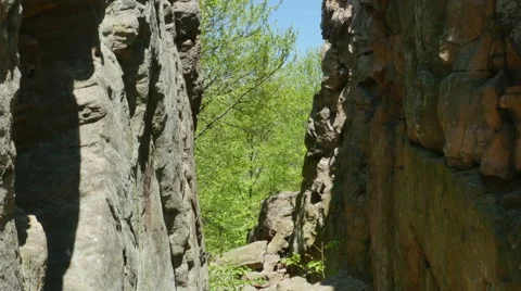 3562 Split Rock Cliff Blue Sky Forest, HD Video stock 50194687