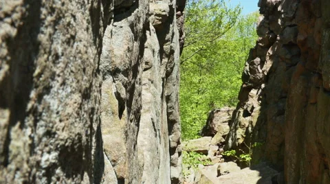 3564 Split Rock Cliff Blue Sky Forest, 4K Video stock 50152746