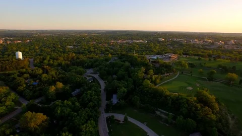 3.57 Manhattan Golf Course Panning Right Over Course to See Sunset 002609 Stock Footage 90258510