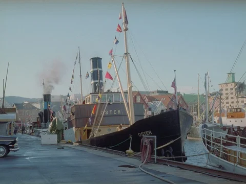 35MM 2K EXT. DAY BERGEN NORWAY- SEAPORT AND SHOP BUILDINGS Stock Footage 75364598