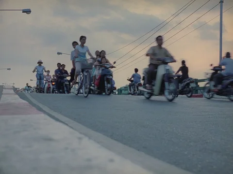 35MM 2K EXT. DAY SAI GON , VIETNAM- MOTORBIKES TRAFFIC OVER BRIDGE Stock Footage 75376204
