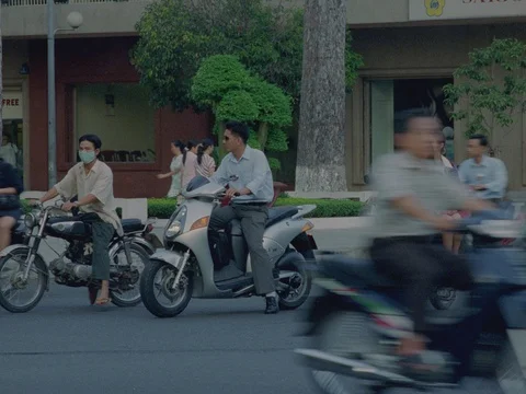 35MM 2K EXT DAY-SAIGON VIETNAM- TRUCKS MOTOS ON STREET Stock Footage 75374305