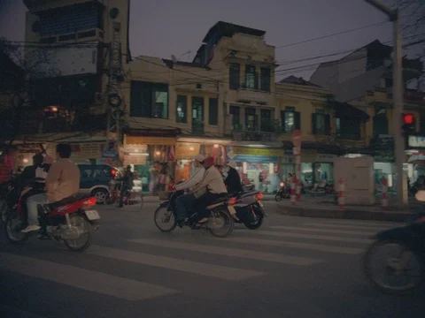 35MM 2K EXT. DUSK HANOI , VIETNAM- CAR POV SIDE - MOVING L TO R -W TRAFFIC Stock Footage 75375697