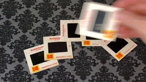 35mm Kodachrome Slides on Table Stock Footage 122592608