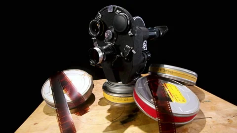 Movie Film Reels And 35mm Camera Photo Movie Stock Photo, Picture