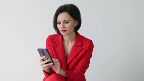 35s nice-looking attractive gorgeous charming cheerful woman using phone Stock Footage 180396228