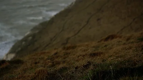 36 Panning shot of Lighthouse on cliff in eastbourne kent england white ocean Stock Footage 130938675
