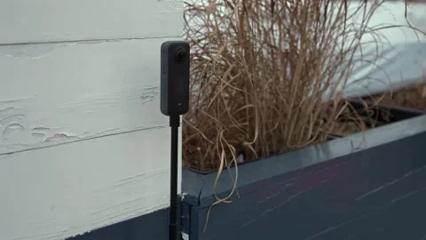 360 camera holding on a tripod 動画素材 295077191