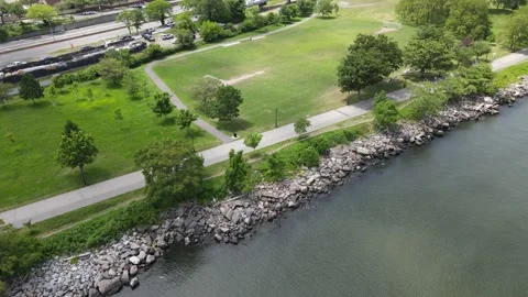 360 Circle of Water Side by Park - Drone Footage Stock Footage 158030073