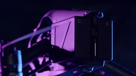 360 close-up of DJI Inspire 2 drone in cinematic lighting with zoom lense Stock Footage 129289905