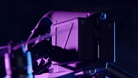 360 close-up of DJI Inspire 2 drone in purple cinematic lighting Stock Footage 129290137