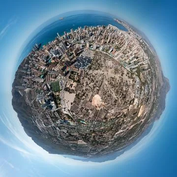 360 Degree aerial drone tiny planet photo of the city of Benidorm in Spain .. Stock Photos