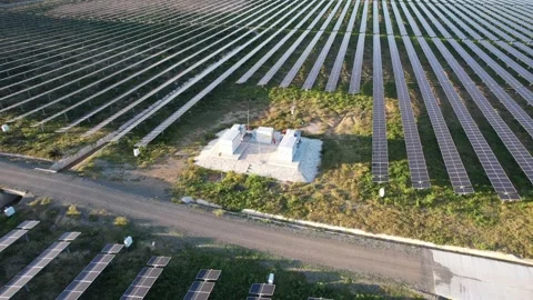 A 360-Degree Drone View of a Solar Farm Power Station Stock Footage 233653906