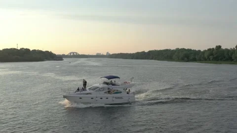 360 degree flight around a sailing yacht on the Dnieper River Stock Footage 195683105