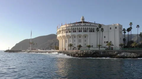 360 degree pan of Avalon harbor waves yachts moorings dry land and sun shine Video stock 67960815
