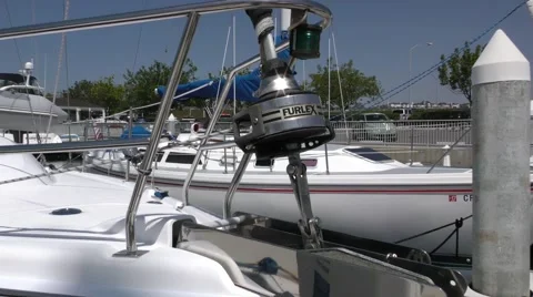 360 degree panoramic view of sail and motor yachts at a dock on a sunny morni Stock Footage 67491721