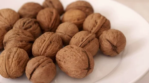 360 degree rotating stand walnuts very close-up, Vídeo Stock 126788075