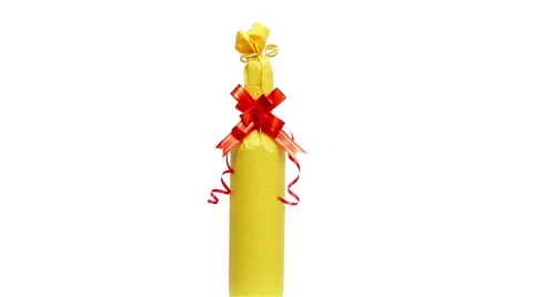 360-degree rotating wrapped wine as gift on white Stock Footage 44401484