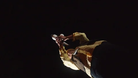 360 degree rotation shot of magician hol... | Stock Video | Pond5