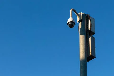 360 degree security camera on pole and blue sky Stock Photos