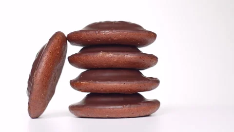 360-Degree Spin of Chocolate Cookie Stack on White Background Stock Footage 286833893