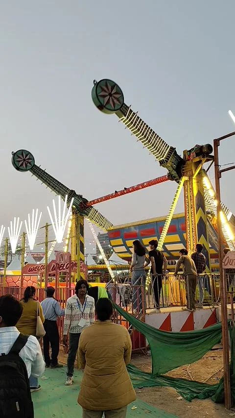360 Degree Swing Ride Collapses in Mid-Air at Surajkund Fair, Surajkund, Faridab Stock Footage 328537144