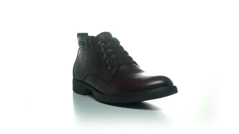 360 degree view of brown leather boot Stock Footage 276050499