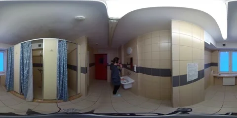 360-Degree View of a Female Using Public Restroom Facilities Stock Footage 264327264